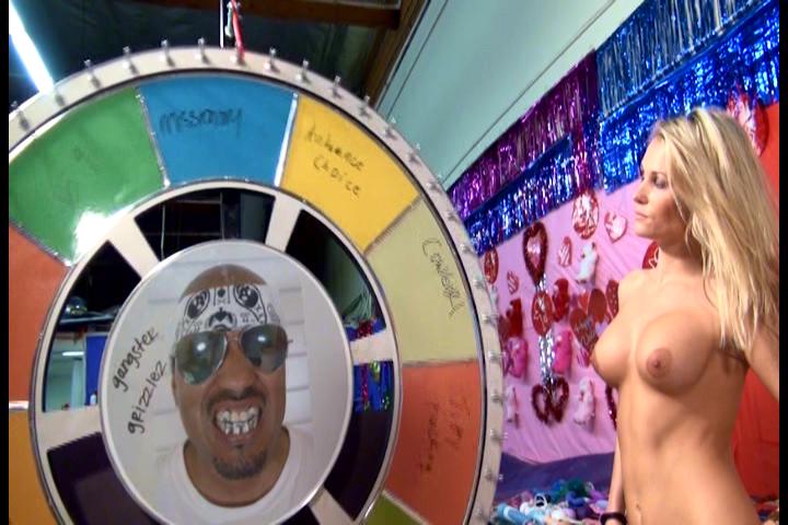 a busty blond with a pretty face, was up next as she spun the wheel to win ...